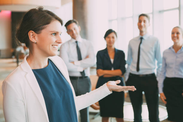 Happy Female Executive Manager with Team