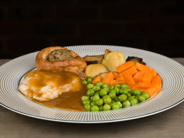 istock Roast Lunch or Dinner of Roast Chicken With Yorkshire Pudding and Stuffing 642528386