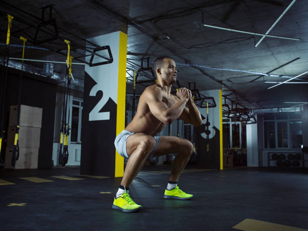 istock Gym training: Male athlete in action 642529188
