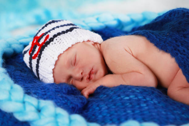 istock Cute newborn baby girl sleeping 642531798