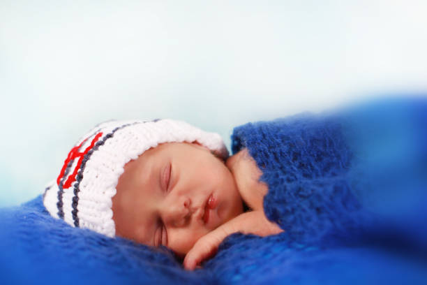 istock Cute newborn baby girl sleeping 642532042