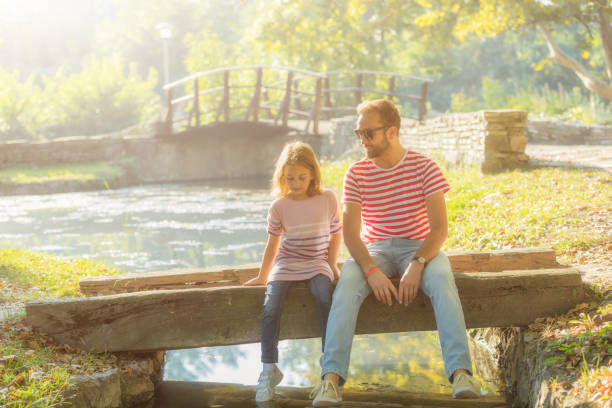 istock Father and daughter enjoying in the park. 642532772