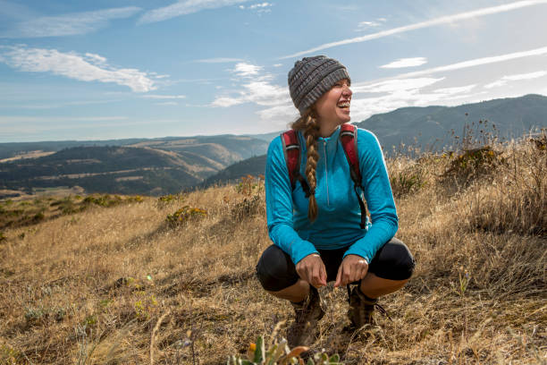 istock Smiling Woman on a Hike 642536856