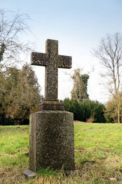 istock stone cross in a park or gravestone in a cemetery 642554140
