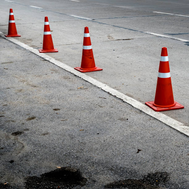 istock Plastic orange cone on the asphalt road 642559646