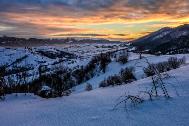 istock winter sunrise in mountainous rural area 642563724