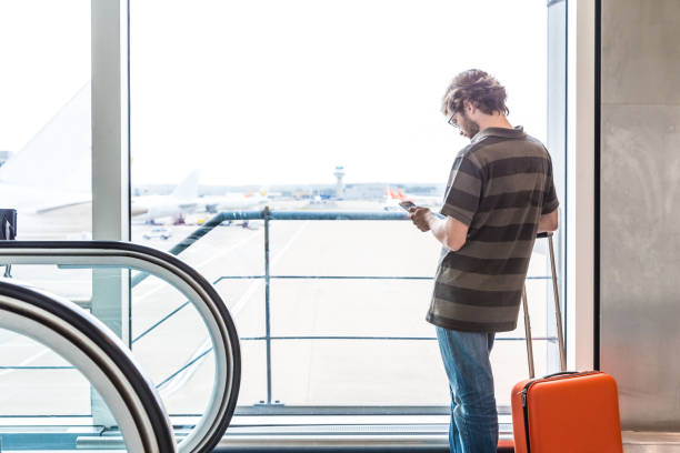 istock man at the airport 642574526
