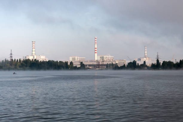 istock Kursk Nuclear Power Plant reflected in a calm water surface. 642578730