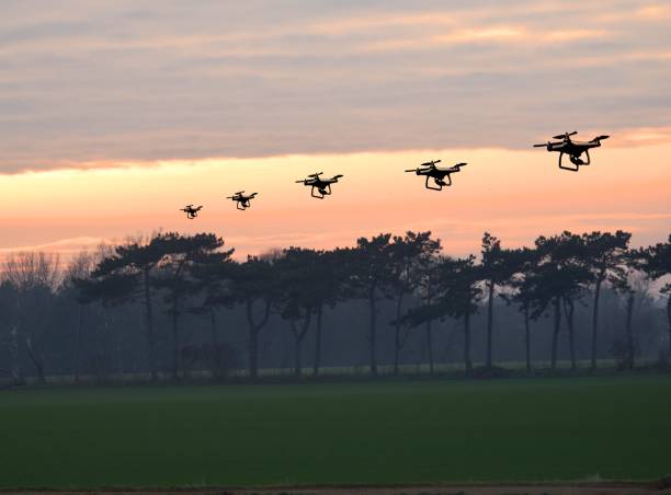 istock multiple exposure of flying drone travelling at sunset 642591136