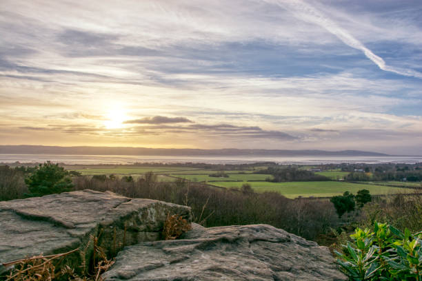 sunset at red rock thurstaton - merseyside imagens e fotografias de stock