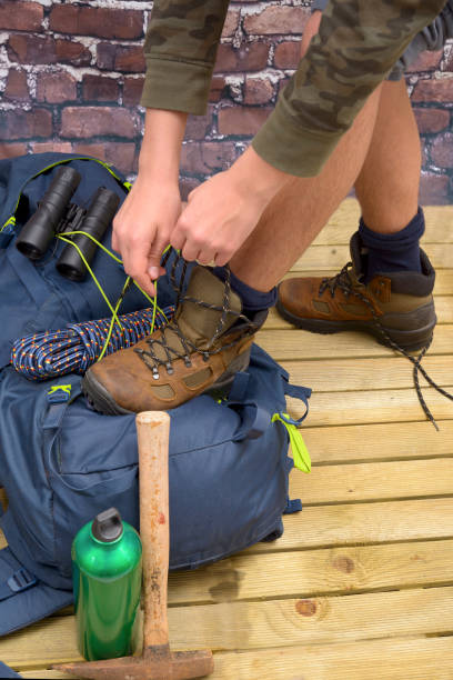 istock Hiking equipment, rucksack, boots and backpack. 642598592