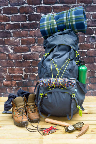 istock Hiking equipment, rucksack, boots and backpack. 642598608