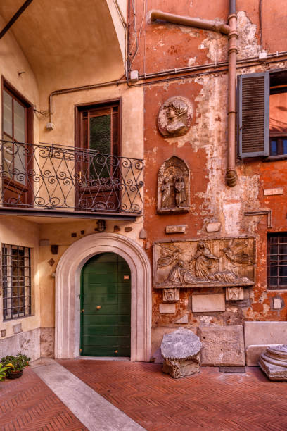 istock Entrance and windows in a roman courtyard 642620318
