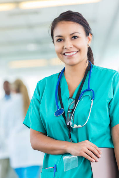 istock Busy nurse walks in hospital corridor 642622654