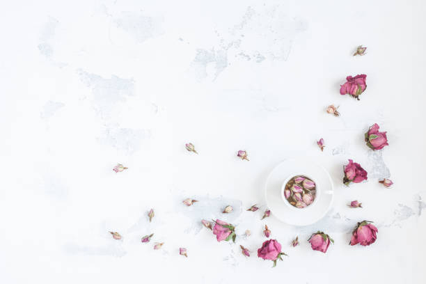 istock Composition with cup of tea and dried rose flowers 642625640