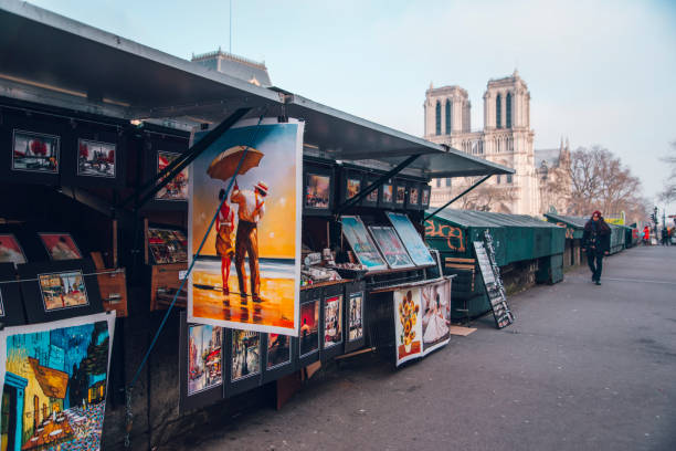 Paris, France. 22 January 2017 - One of the stalls along the Seine river in Paris, open and showcasing some beautiful art for sale. These stalls are known as 'Les Bouquinistes'.