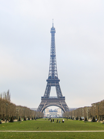 Aerial view of Paris with Champ-de-Mars, Eiffel Tower and skyscrapers of La Defense