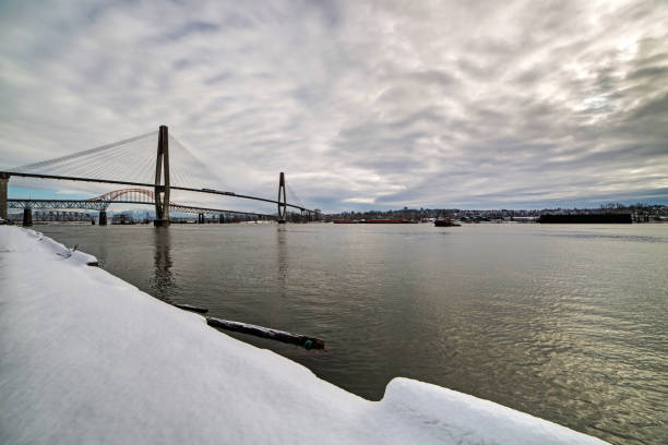 istock winter view of river and riverside 642649950