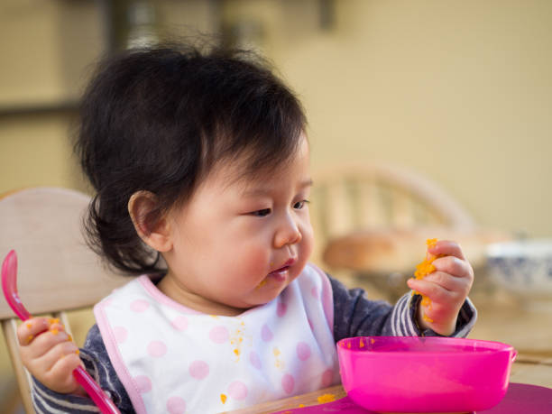 istock eating mess baby girl 642652950