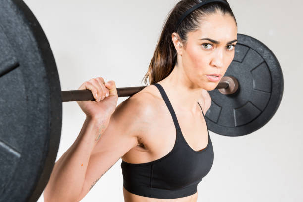 istock Women Lifting A Barbell 642666348