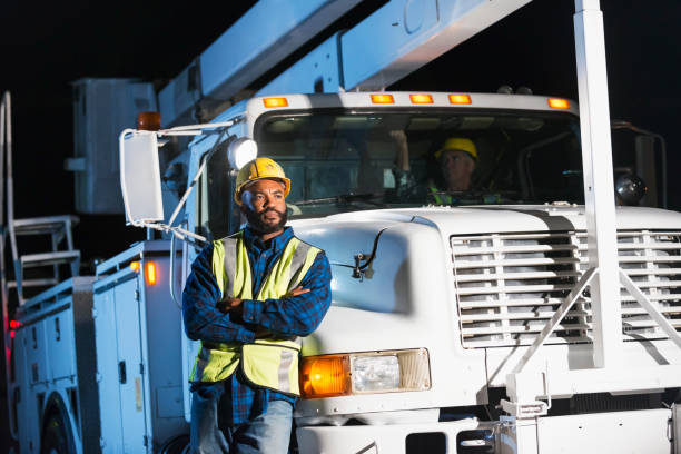 istock African American man with cherry picker truck 642677662