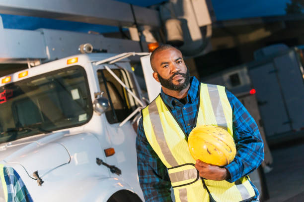 istock African American man with cherry picker truck 642677674