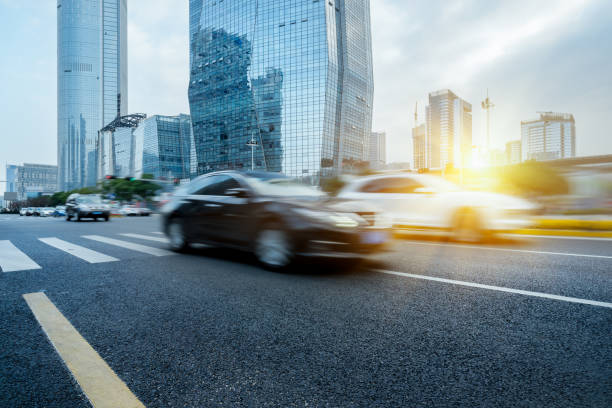 istock urban traffic with cityscape 642686114