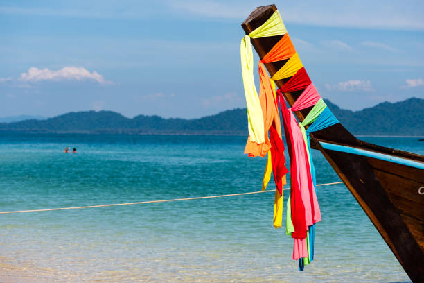 istock Bow of Thai longtail boat with colorful decoration 642686356