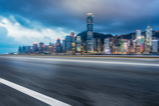 istock empty asphalt road with Hong Kong downtown skyline on background 642694048