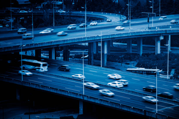 istock urban traffic with cityscape 642697032