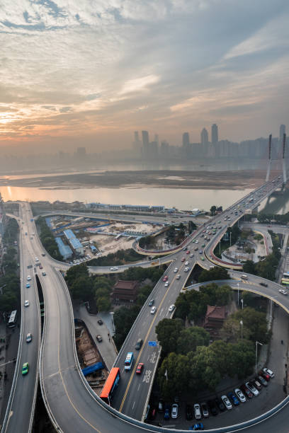 istock urban traffic with cityscape 642699348