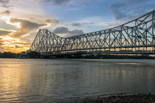 istock Historic Howrah bridge on river Hooghly at sunset. 642705228