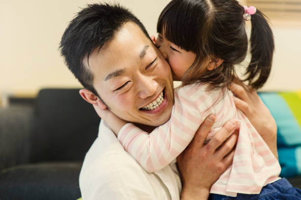 istock Father and daughter playing together at home 642708672