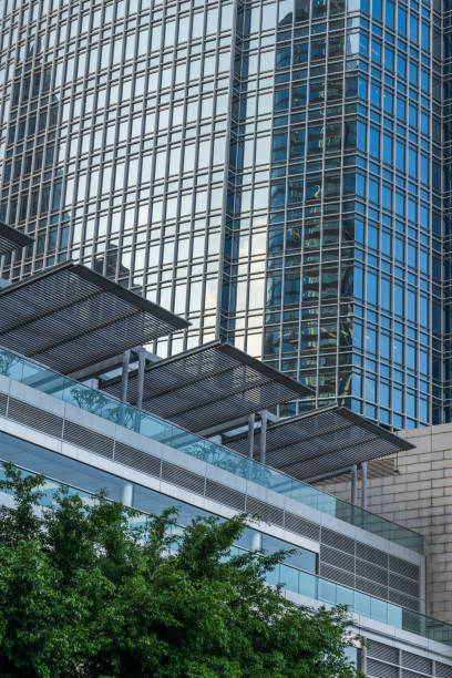 istock modern office building with green fresh leaves 642712016