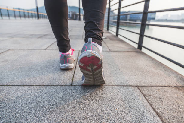 istock Closeup of female runner legs going for a run 642712966