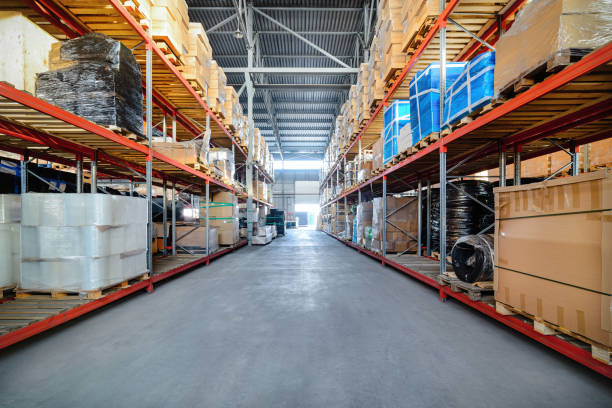 istock Long shelves with a variety of boxes and containers. 642715198