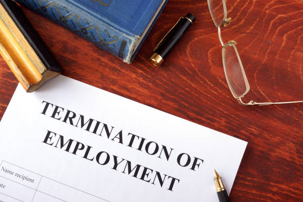 istock Termination of employment form on a wooden surface. 642718518