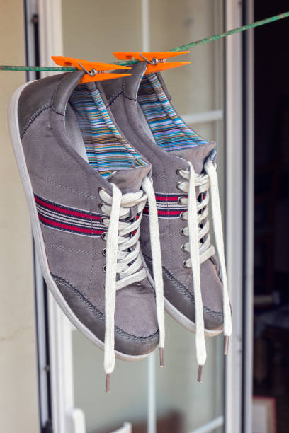 istock Sneakers hanging on rope 642732590