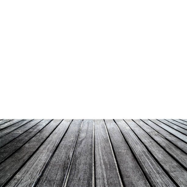 istock Rustic wood table in front empty space. Wooden table isolated on a white background, display for you design 642737756
