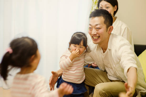 istock Family playing together at home 642747978