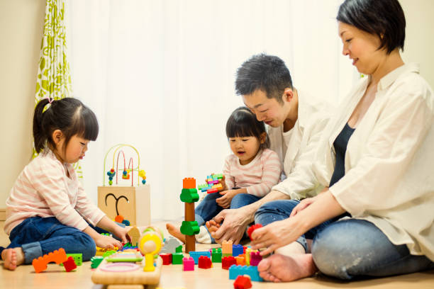 istock Family playing together at home 642748314