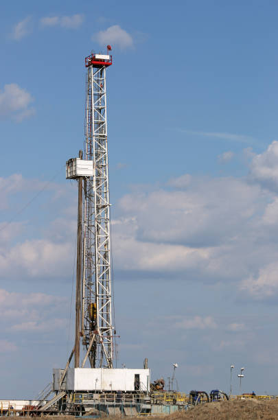 istock Oil drilling rig and mining equipment on oilfield 642751052