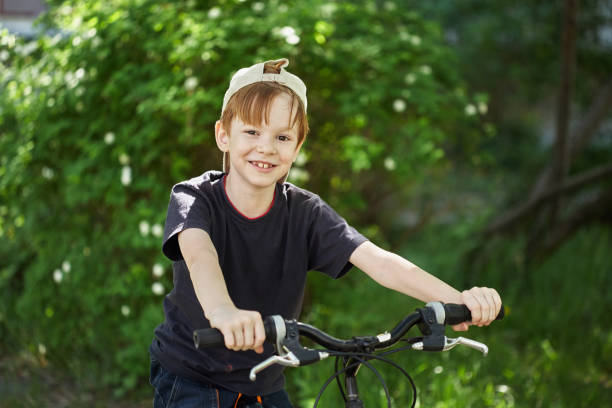 istock The Kid with a Bike 642751234