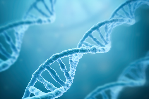 Filamentos de la DNA sobre fondo azul photo