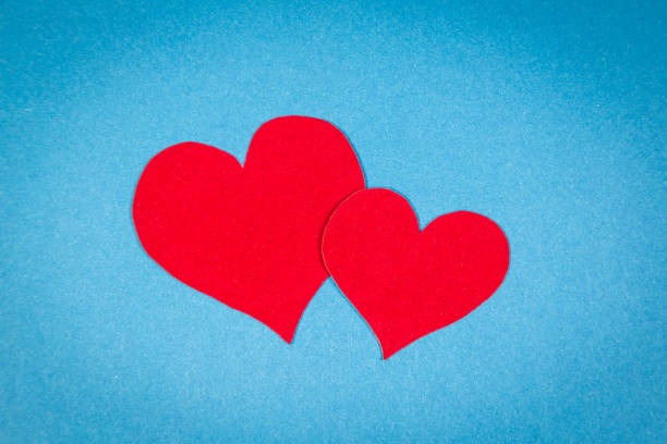 istock Velvet red paper hearts 642767596