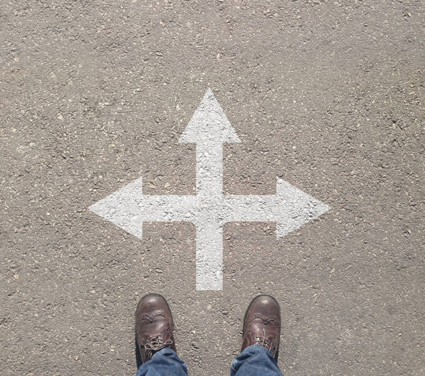 istock standing at the crossroad making decision which way to go 642785476