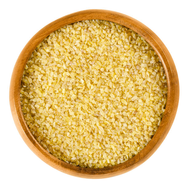 istock Uncooked bulgur or burghul in wooden bowl 642788534