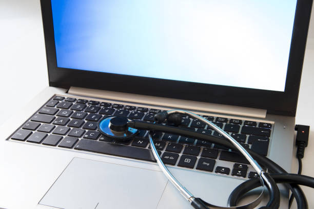 istock Computer protection, stethoscope on a business laptop keyboard 642798022
