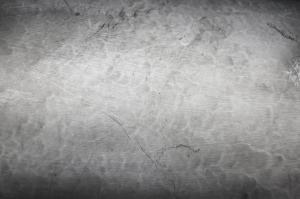 istock Grey metal background, texture of steel. Abstract grunge surface 642799488