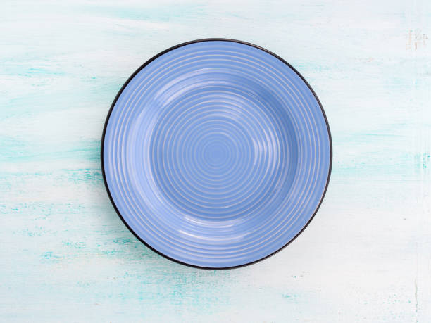 istock Pastel Color ceramic plate dish top view background 642813088